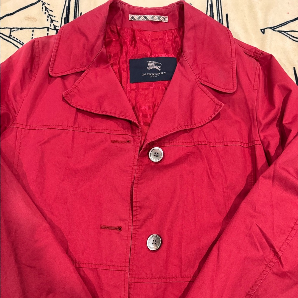 Red Burberry trench coat